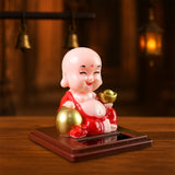 Solar Power Moving Head Buddha Statue Car Ornament (1 Pc  Mix Color)